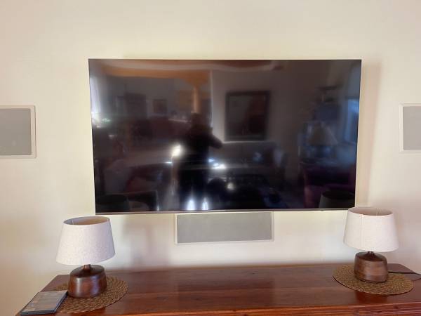 65 inch Samsung TV (works perfectly). Accessory box and wall mount. 1