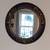 Beautiful old Round wood framed mirror in Dark brown wood/antique gold 1 thumbnail