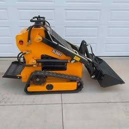 Stand on mini track loader 1