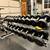 American Barbell Series 1 Urethane 5-50lb dumbbell set with 2 tier rack LIKE NEW 6 thumbnail