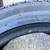 blue line  tiger paw-uniroyal-touring a/s  185-55R 16    xxxx  tires 6 thumbnail