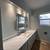 2 bedroom main house with a large living room and sun deck 6 thumbnail
