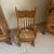 Child’s Antique pressed back rocker with hand caned seat 1 thumbnail
