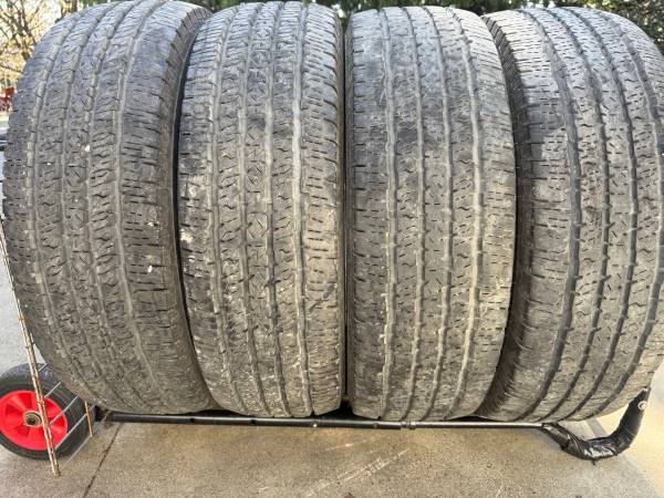 Set of 4 LT275/70/18 Firestone Transforce HT tires 1