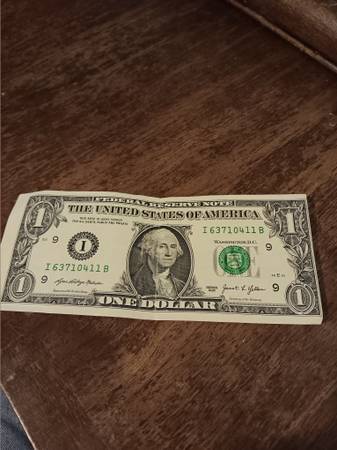 off centered dollar bill 1