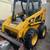 Cat skid steer & Pj dump trailer 1 thumbnail