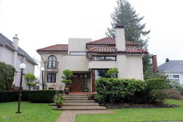 Mediterranean Inspired Furnished Garden Suite in Kitsilano #428 1