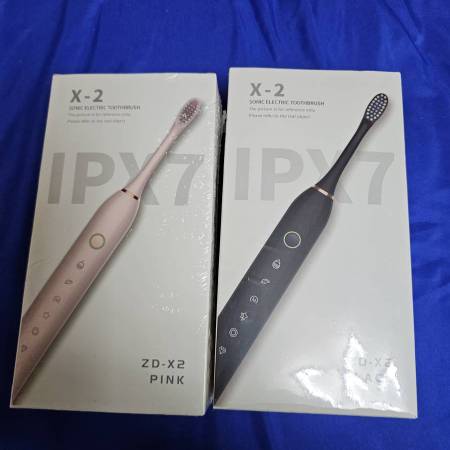 2 New Sonic Electric Toothbrushes 1