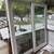 Custom sliding doors: wood clad, insulated glass, color white - $1,500 1 thumbnail