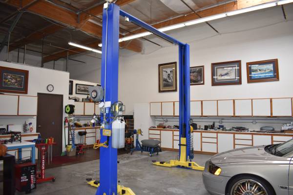Two Post, Clear Floor, Car Lift 9,000 lb Asymmetric 1