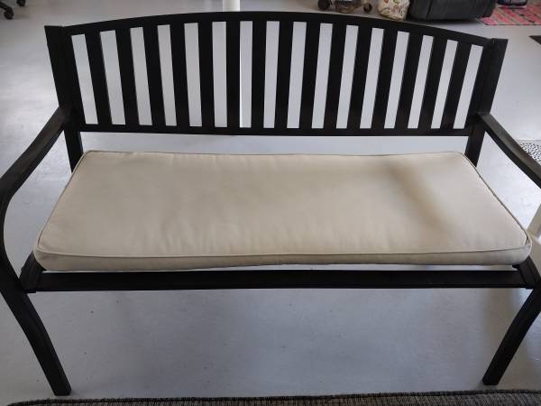 Outdoor or indoor bench with cushion and is  comfortable 1