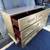 BEAUTIFUL LIKE NEW QUALITY WOODEN DRESSER IN BRASS COLOR CAN DELIVER LOCAL 5 thumbnail