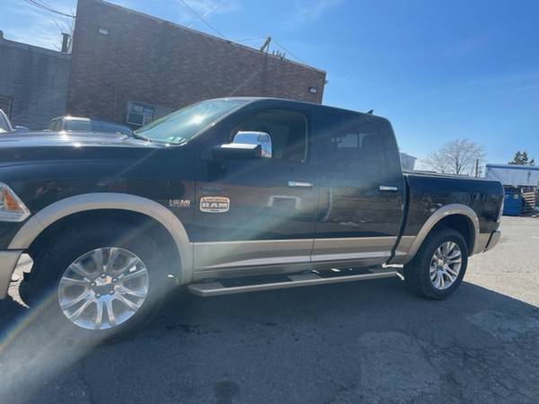 2014 Ram Laramie Longhorn 5.7 Hemi 4x4, cuero, techo solar, motor nuevo, 68K millas - $8.995 (Temple Hills, MD 20748)63440027617793124