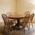 Oak Pedestal Dining Table with Leaf and 6 Chairs 1 thumbnail