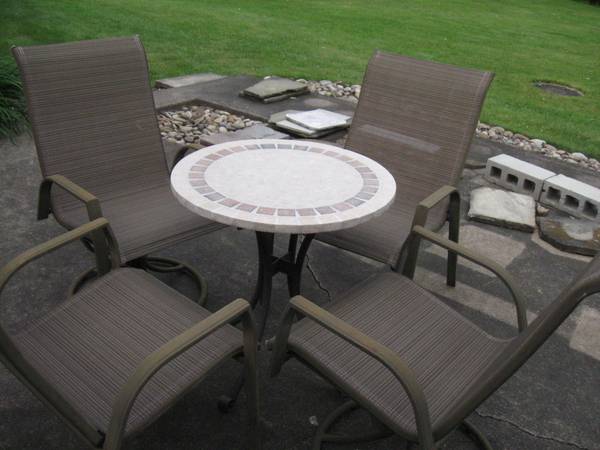 OUTDOOR TABLE WITH STONE TOP, AND 4 CHAIRS - 2 SWIVEL 1