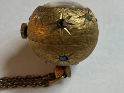 Lost antique gold tone watch orb pendant 1