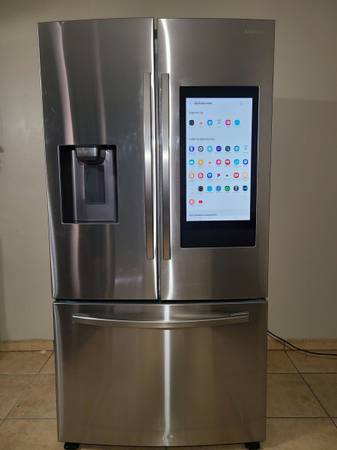 This very spacious, 3-door stainless steel Samsung refrigerator 1