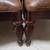 round wooden dining table, 6 chairs, chest freezer, plants 3 thumbnail