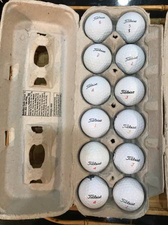 Dozen playable Titleist golf balls 1