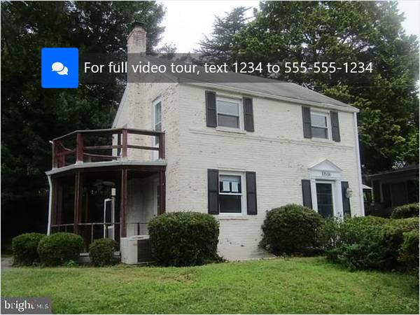 Charming Colonial in Woodmoor: Large Lot, Detached Garage, Cozy Firepl 1