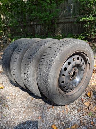 4 used 16" steel wheels and Michelin snow tires 1