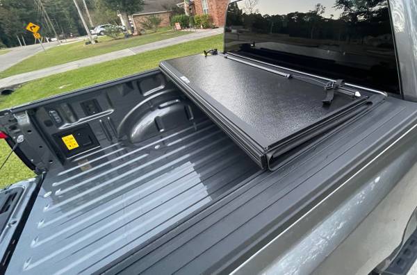 Tri-fold bed cover for Ram truvk 1