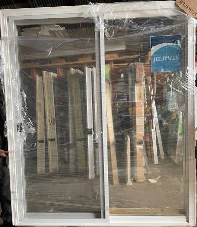New 73x87 JeldWen white vinyl sliding patio door 1