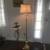 Pretty cut glass floor lamp brass finish with a swivel arm. 1 thumbnail