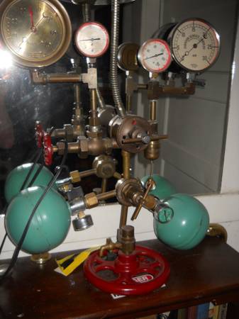 A home made steampunk lamp with lighted gauges 1