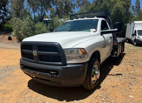 2014 ram 3500 diesel 4X4 reg cab flatbed low miles - $20,00063612899748097121