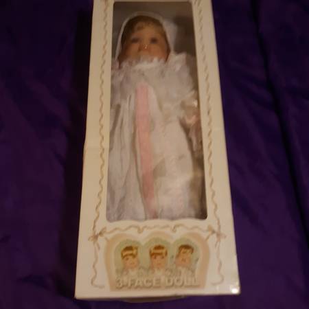New in the Box 3-Faced Porcelain Doll - $150 (Dothan)63440451037441122