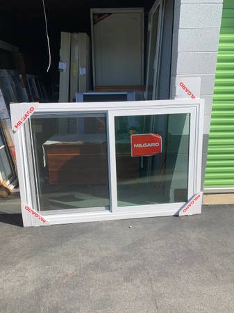 Milgard slider window 68 1/2”x 43 1/4” 1