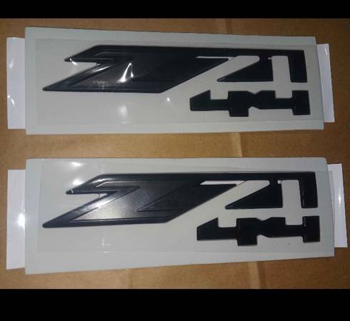 2pc emblems ( info in pics) 1