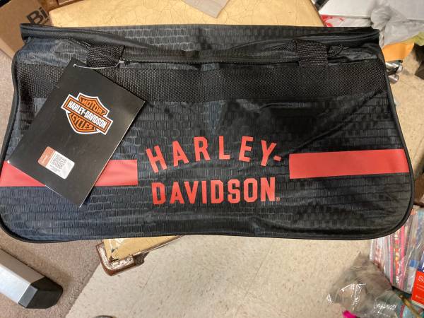 Motorcycle jacket/ Yamaha sweatshirt/ Harley bag 1