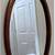 Charming Antique Oval Ornate Wood Beveled Mirror 1 thumbnail