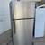 16 cubic ft black & Stainless ge refrigerator works great clean 1 thumbnail