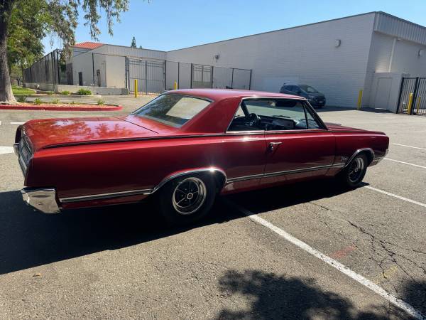 1965 Oldsmobile Cutlass Holiday Coupe 455 Rocket 4 velocidades - $19,500 (Concord)63438506203009124