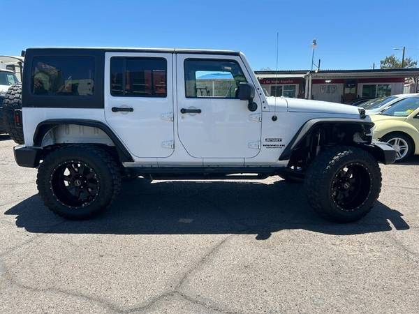 2015 Jeep Wrangler Unlimited Sport - $18,49963470597016833123