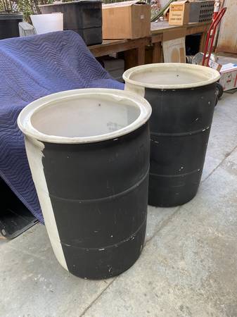 55 Gallon White Plastic Barrels 1