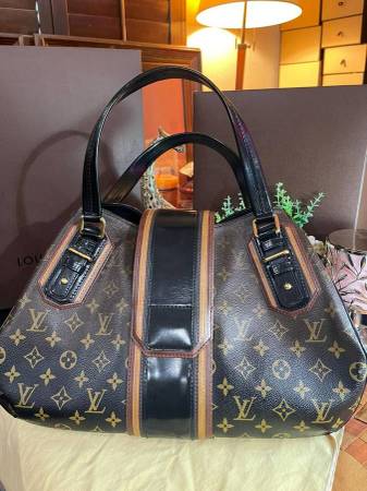 Authentic Louis Vuitton Limited Edition Mirage Greit Bag 1