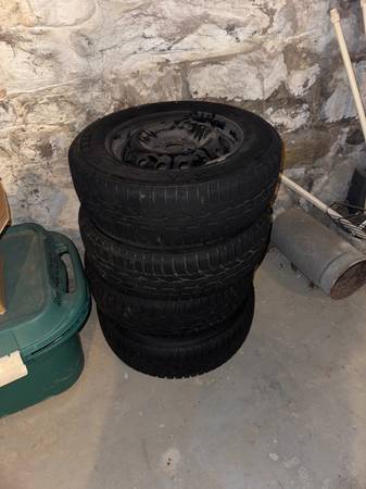 Full set snow tires on wheels 185/65R14 1