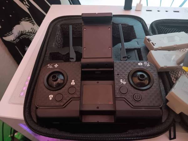 Gray Drone with Controller and 3 Batteries in Case 1