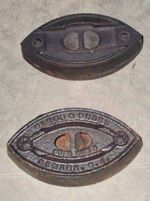 SAD IRONS/ DOOR STOPS - 1