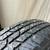 One spare on a rim + 2 tires 3 thumbnail