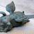 Solid Metal Flying Pig at rest flat forest green patina 1 thumbnail