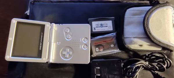 Nintendo Gameboy Advance SP with two games 1