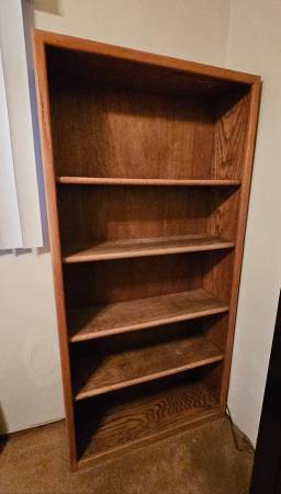 6ft tall oak bookcase. 1