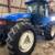 2004 New Holland TV145 w/ Loader & Bucket 1 thumbnail