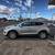 Silver 2019 Hyundai Tucson SE AWD 4-door SUV with 101k miles. 2 thumbnail