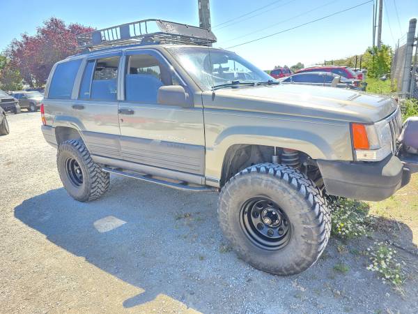 ¡Jeep Cherokee 4x4 elevado de 1997! - $3.700 (Stanwood)63470611515905123